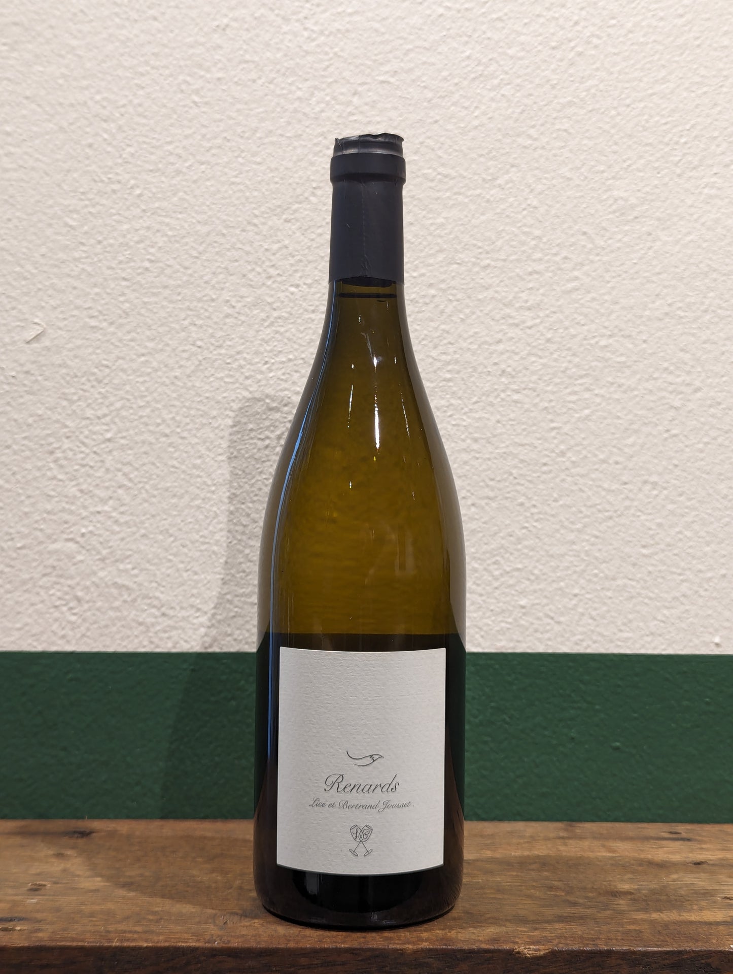 Bottle of Domaine Jousset Montlouis Chenin Blanc. Rare, hand-farmed vineyard on blue clay and silex. Aged in oak, dry and mineral, organic Loire white.
