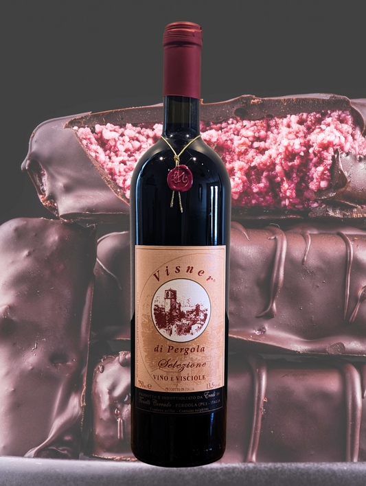 Corrado Tonelli Visner di Pergola Vino e Visciole bottle with Cherry Ripe chocolate bar background – sweet cherry-infused red wine from Marche