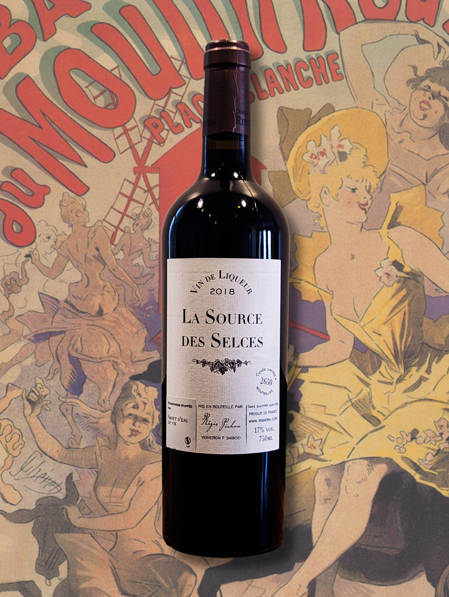 Bottle of Domaine Ribiera Fortified Cinsault from Languedoc. Organic, medium-bodied fortified red wine with soft spice, cocoa notes, and minimal extraction. On a background with a vintage poster of Moulin Rouge.