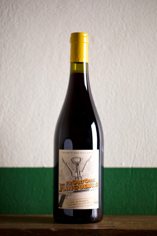 Bottle of La Colombière Negrette from Fronton, France. Biodynamic, estate-grown red wine with medium body, spicy fruit, and earthy savoury character.