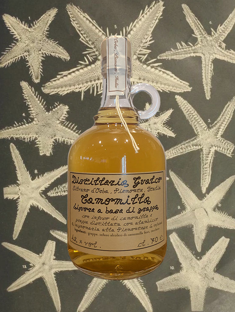 A bottle of Distilleria Gualco 'Camomilla' Liquore di Grappa from Piemonte, Italy