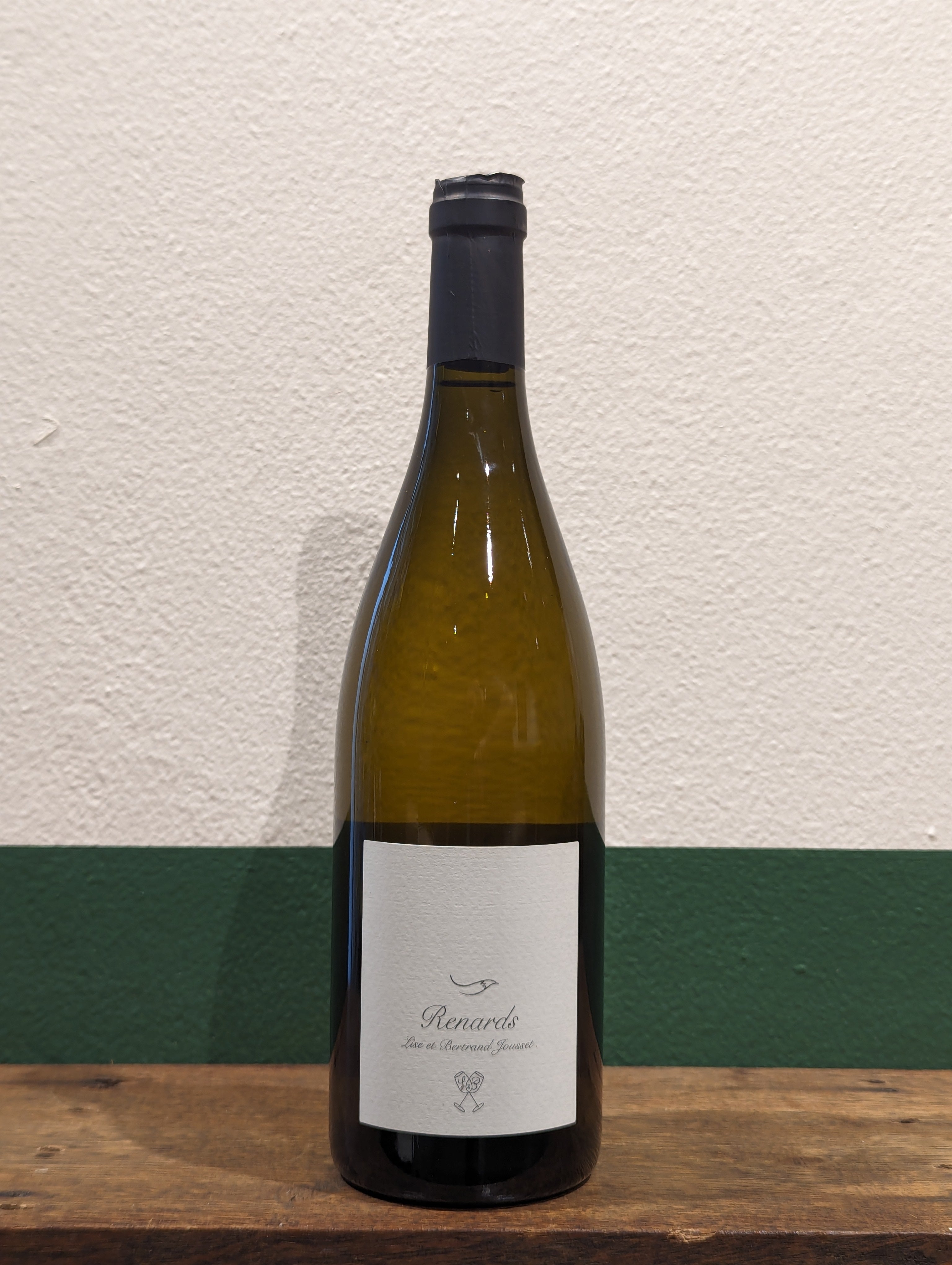 Bottle of Domaine Jousset Montlouis Chenin Blanc. Rare, hand-farmed vineyard on blue clay and silex. Aged in oak, dry and mineral, organic Loire white.

