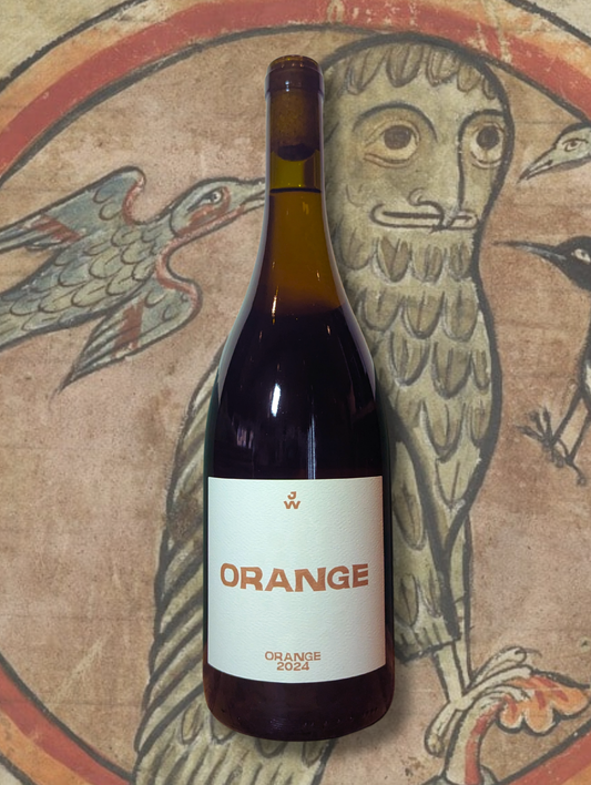Jessop Wines ‘Orange’ 2024 bottle against a medieval bestiary illustration featuring an owl and birds. The textured label and ancient motif echo the wine’s oxidative, skin-contact style and organic roots.