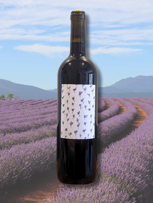 Bottle of Vita Pinot Noir 2023 set against a backdrop of lavender fields. Certified organic Pinot from North Canterbury with no additions, floral finesse, and dark-fruited depth.